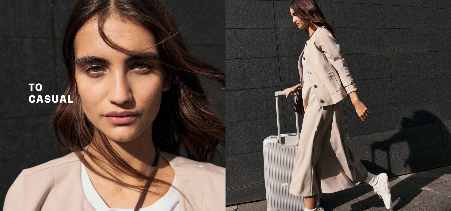 Frau in hellem TO CASUAL Look mit Jacke, Shirt und Rock, dynamisch mit Trolley unterwegs – modern urban inszeniert.