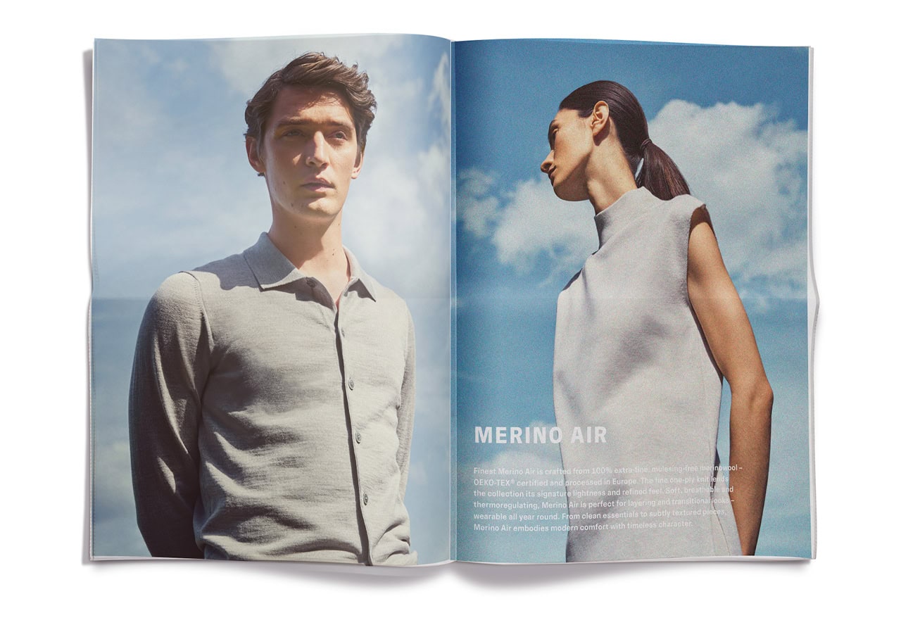 Frau und Mann in leichter Merino‑Air Silhouette vor blauem Himmel – präsentiert unter der Headline ‚MERINO AIR‘.